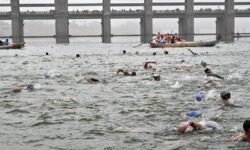 Hundreds of swimmers take part in Krishna river-crossing contest